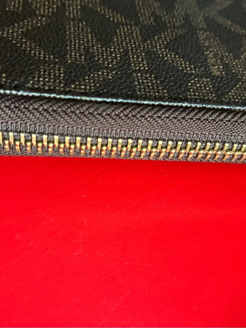 Michael Kors Black and Gold Logo Wristlet